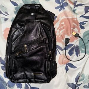Sleek Black Leather Sling Bag
